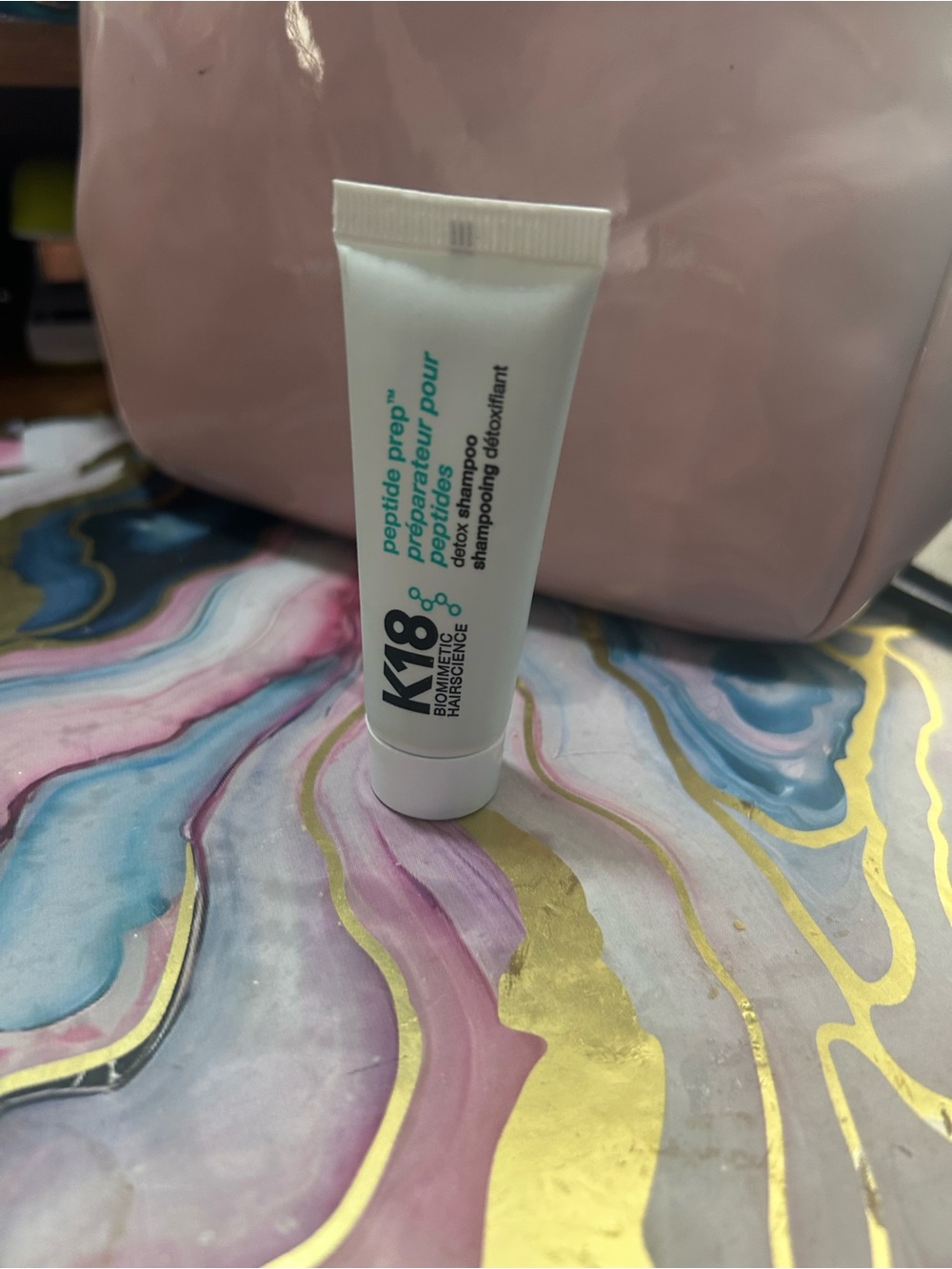 CHANEL White Skincare Tube with Teal Accents